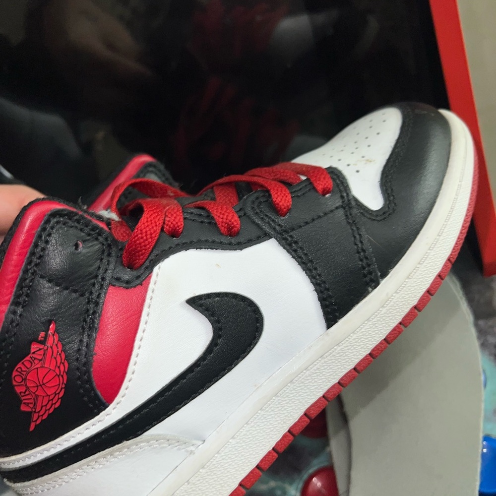 Nike Air Jordan Black, White, and Red Sneakers